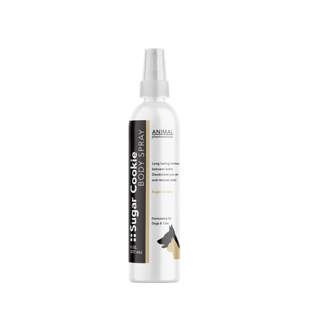 White spray bottle labeled 'Sugar Cookie' 