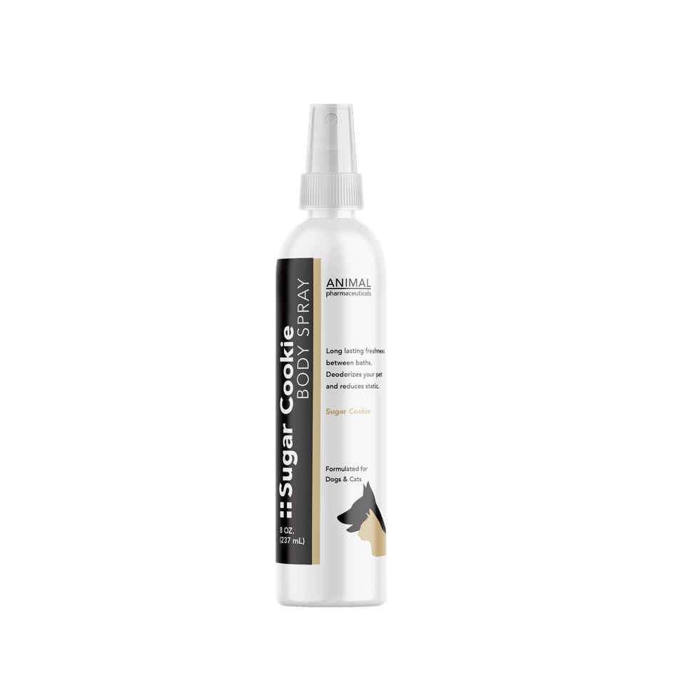 White spray bottle labeled 'Sugar Cookie' 
